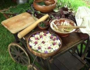 17th Century cooking, a display of decorated eggs and some cooking equipment