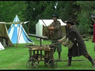 Ian and a collegue firing our falconet swivel gun