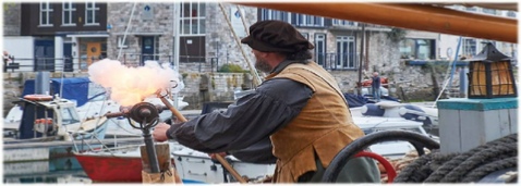 Ian firing a swivel gun at the Plymouth Pirate Festival